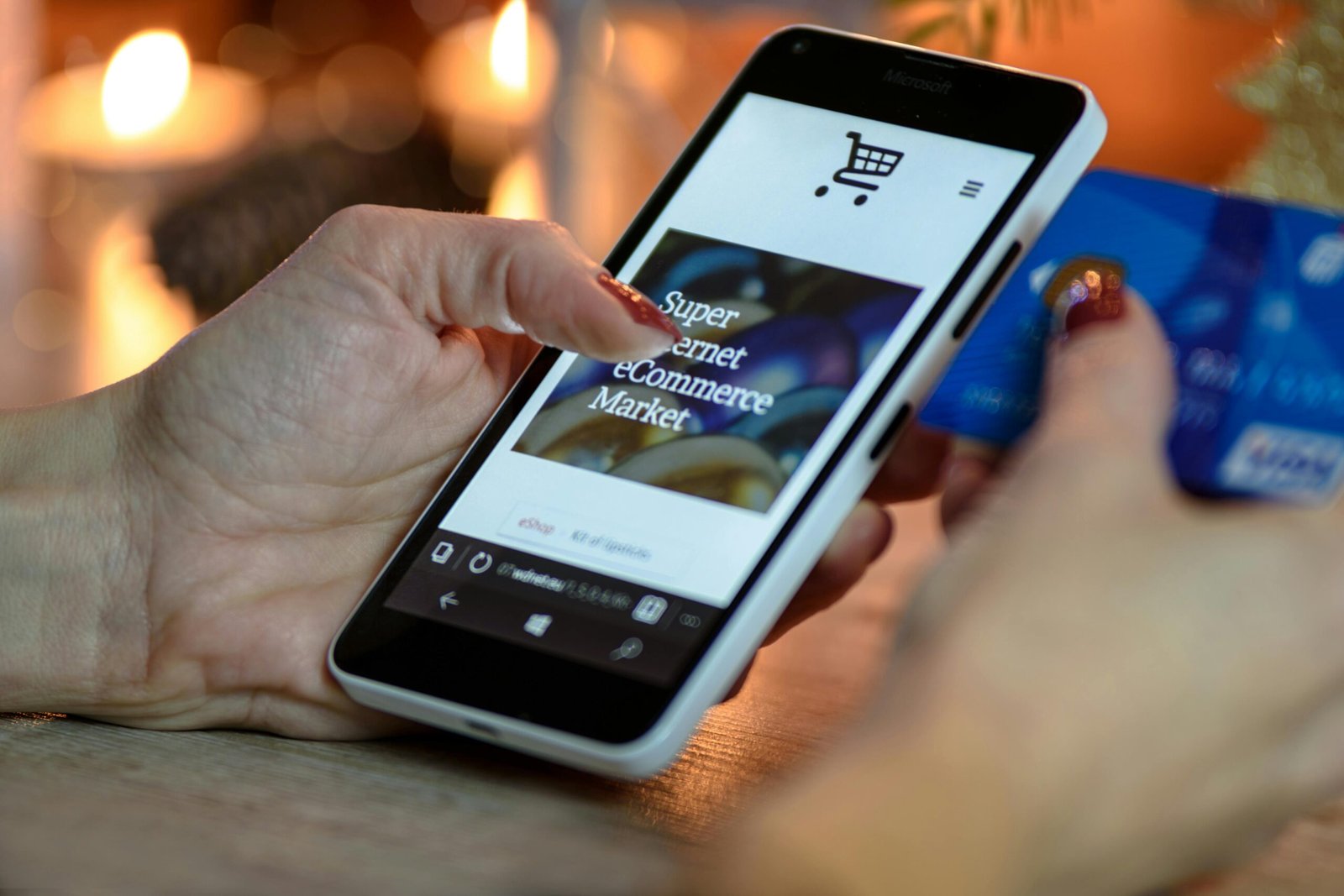 Person holding smartphone with eCommerce app